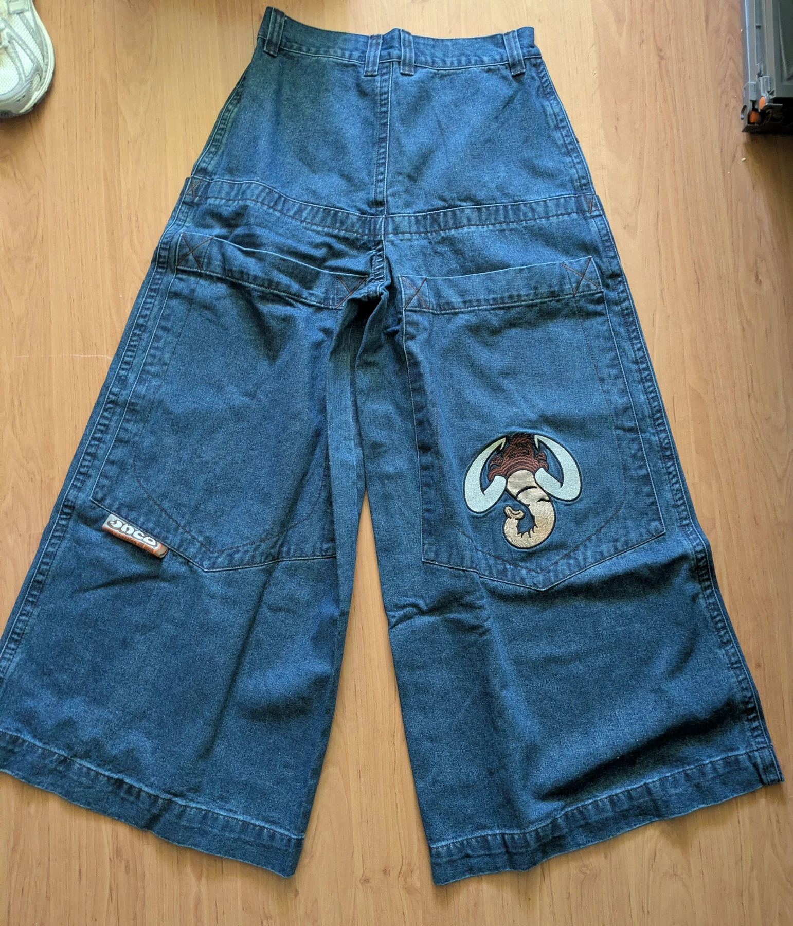 Front of the wide blue denim pair