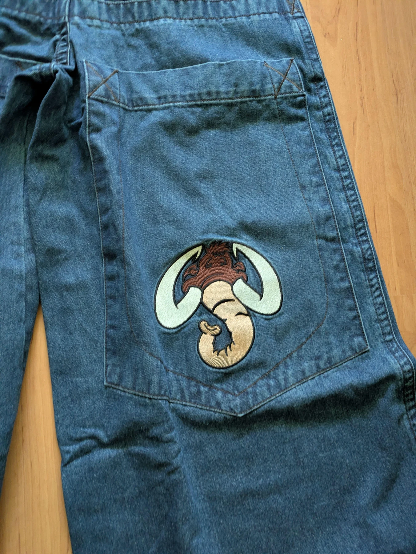 Back pocket graphic on the blue denim