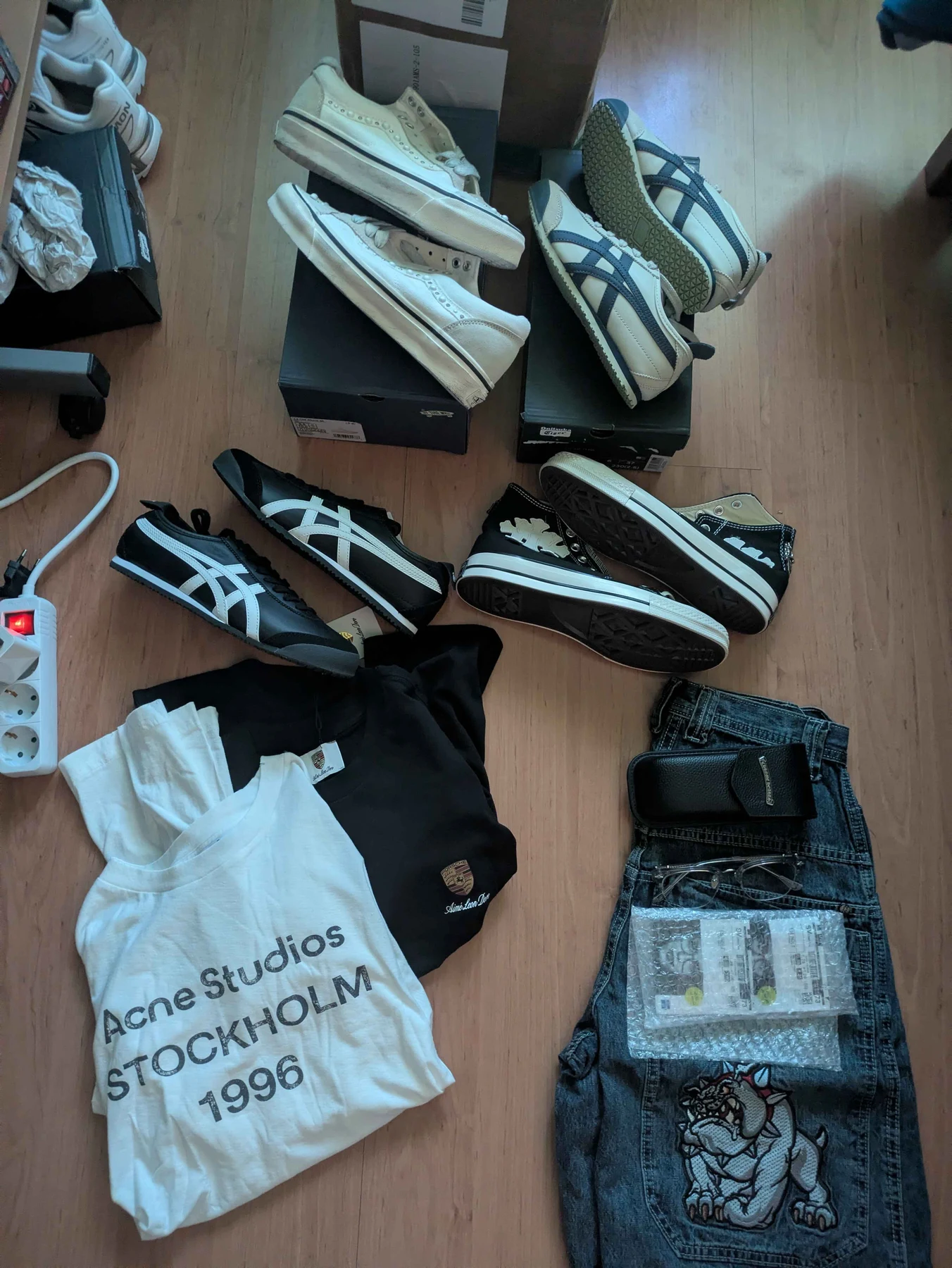 Group photograph of the shoes, tops and denim shorts